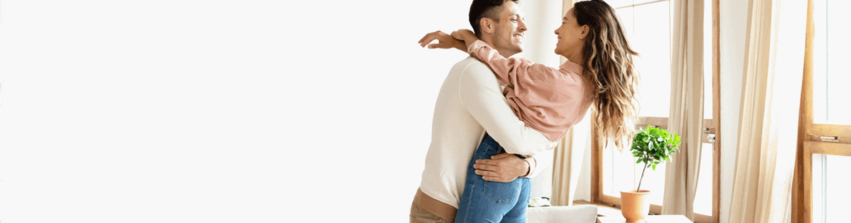 First home buyers celebrating moving into their new house in Australia